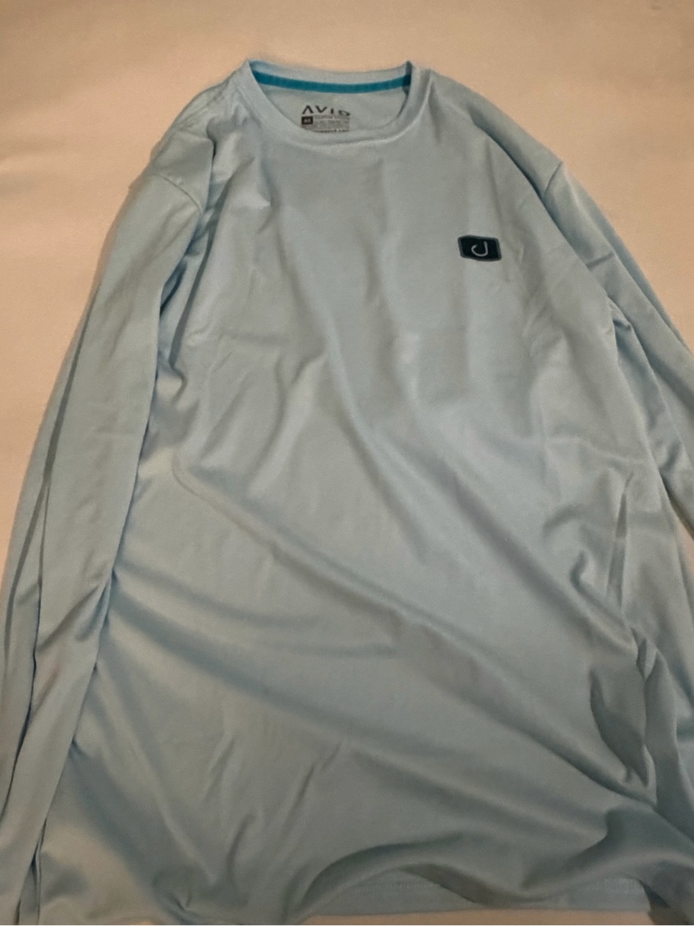 Men’s Long-Sleeve Performance Tee in Light Blue brand new - unworn